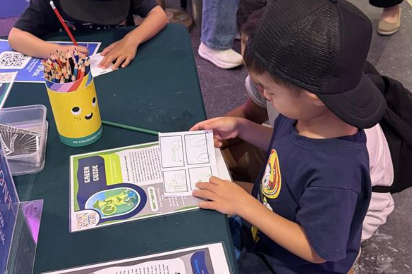A child enjoying an activity at the FRONT workshop