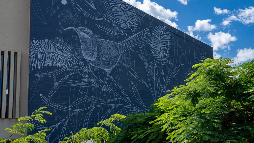A mural of a bird in native foliage on Hampden Road in Crawley