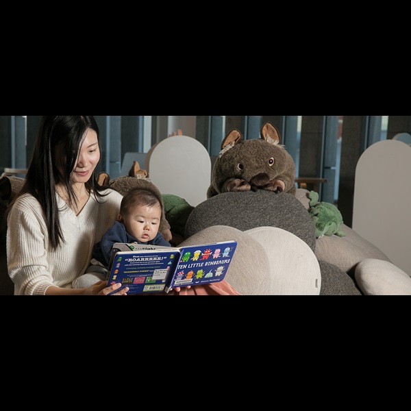 Mother reading to baby