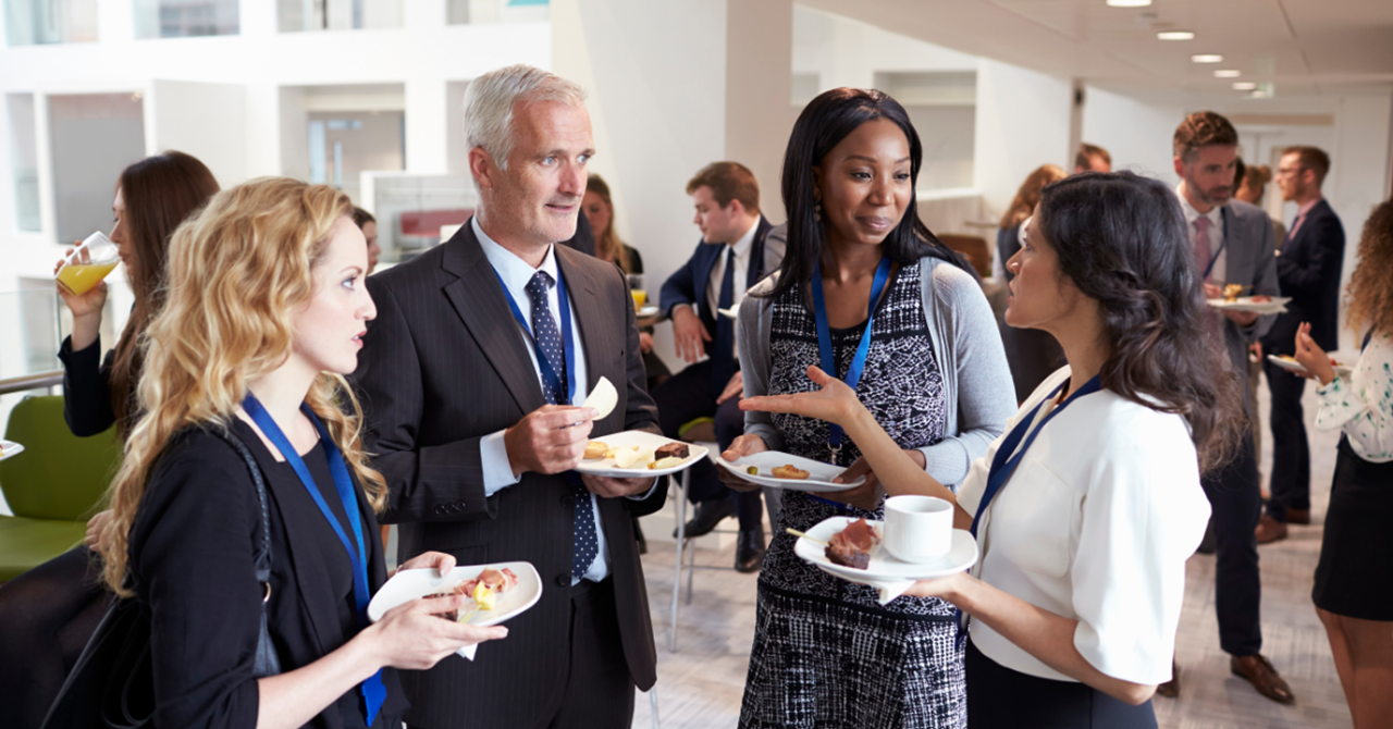 business people talking at morning tea