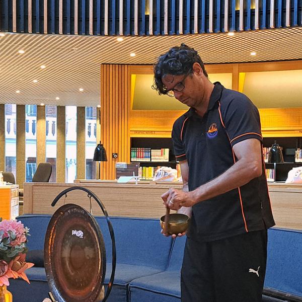 Olman Walley setting up for a sound Meditation session at the Library.
