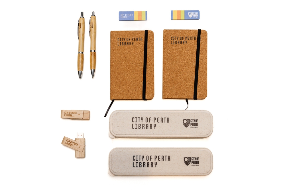 A flat lay of City of Perth Library branded merchandise