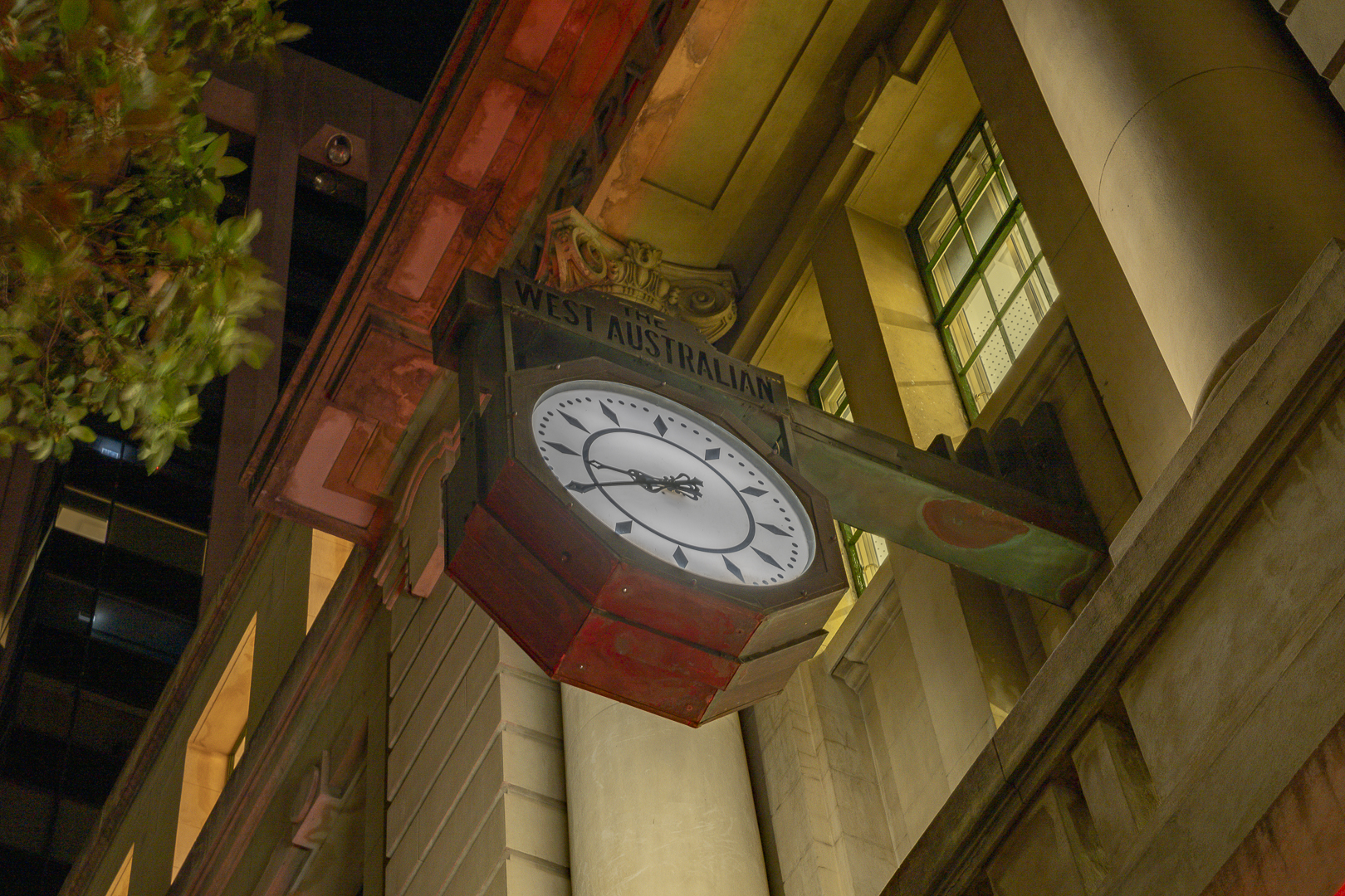 Restored clock on the Newspaper House facade