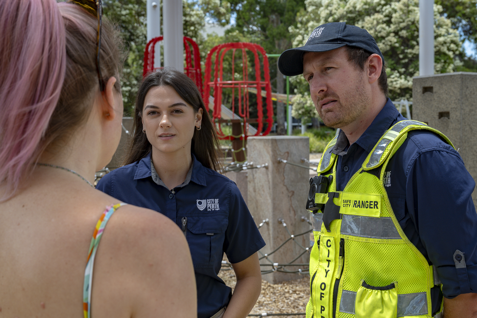 City of Perth safety team members talking to a member of public in Wellington Square