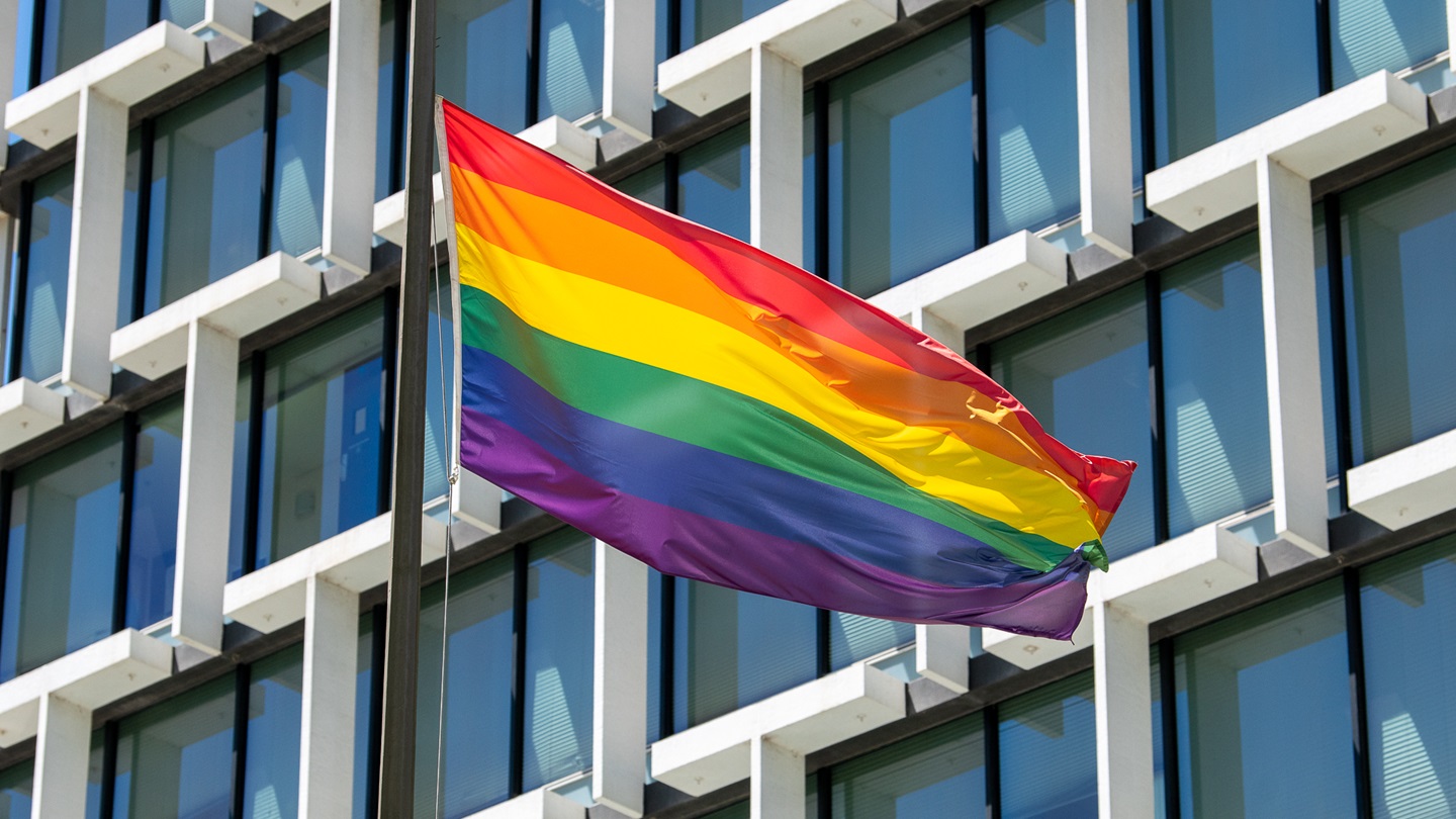 Rainbow flag in front of building