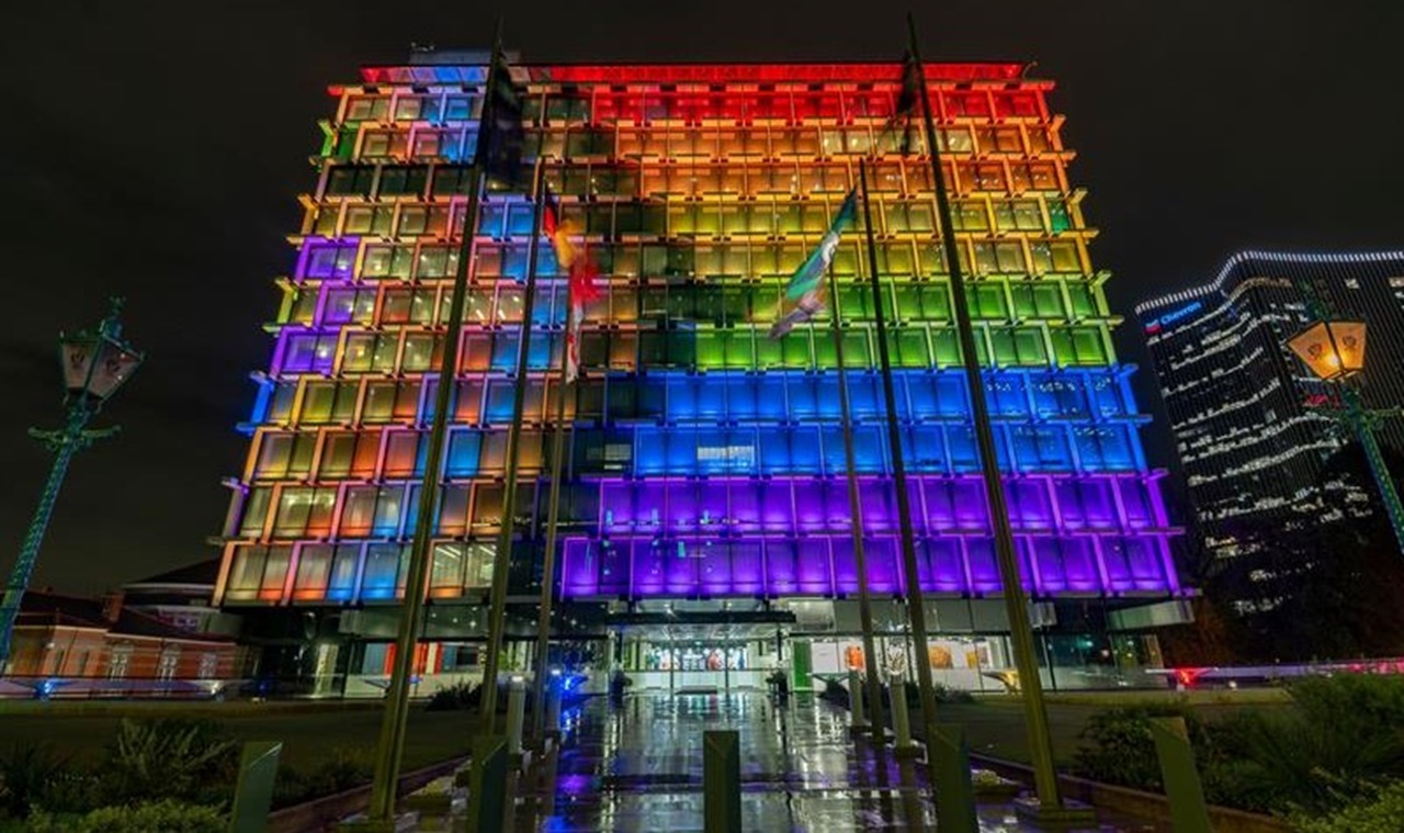 Council House lit in the colours of the LGBTQIA+ flag