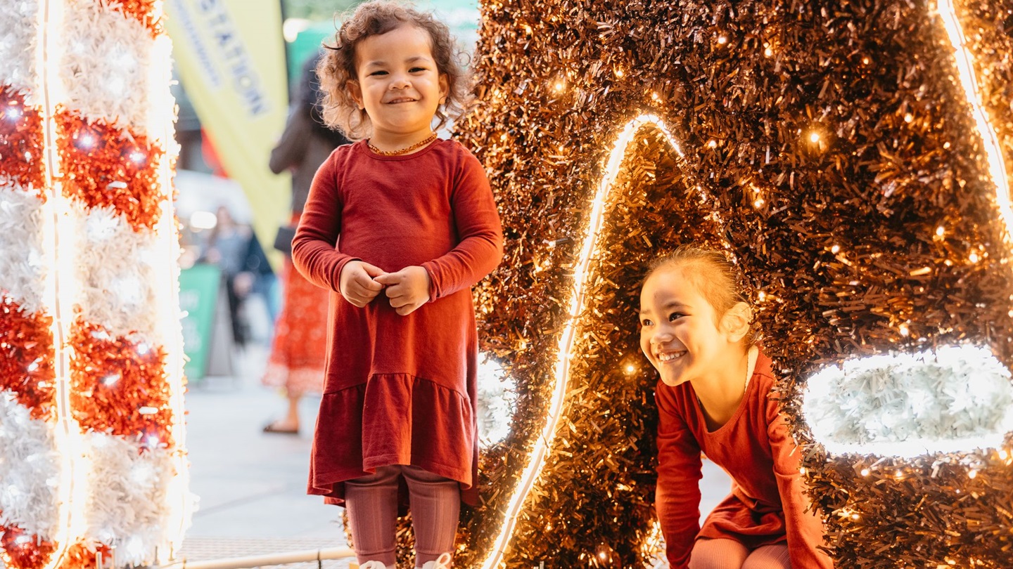 Young girls enjoying the Christmas Lights Trail