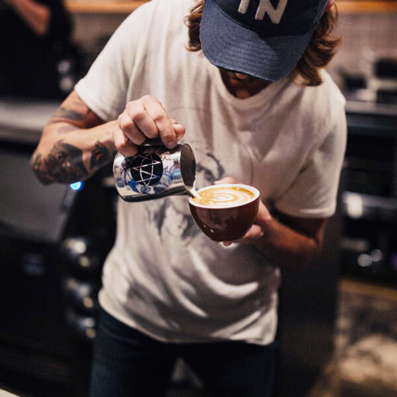 Barista creating latte art