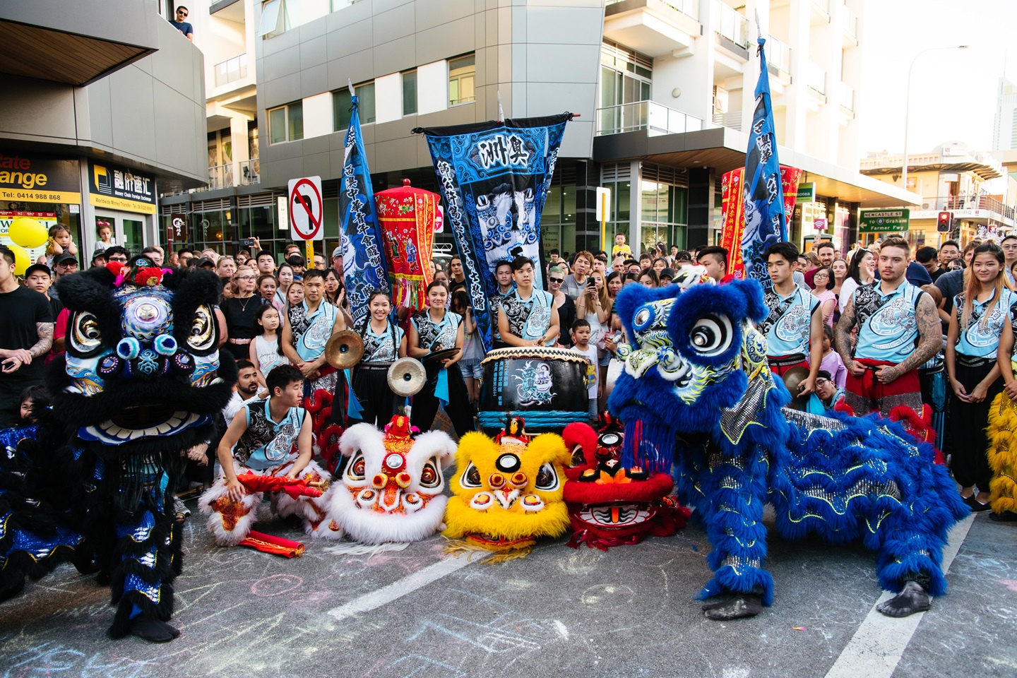 People dressed up as lions and dragons for Lunar New Year