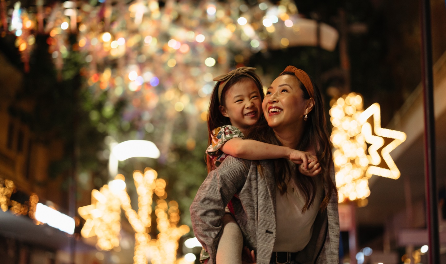 A mother and daughter enjoying the Christmas Lights Trail
