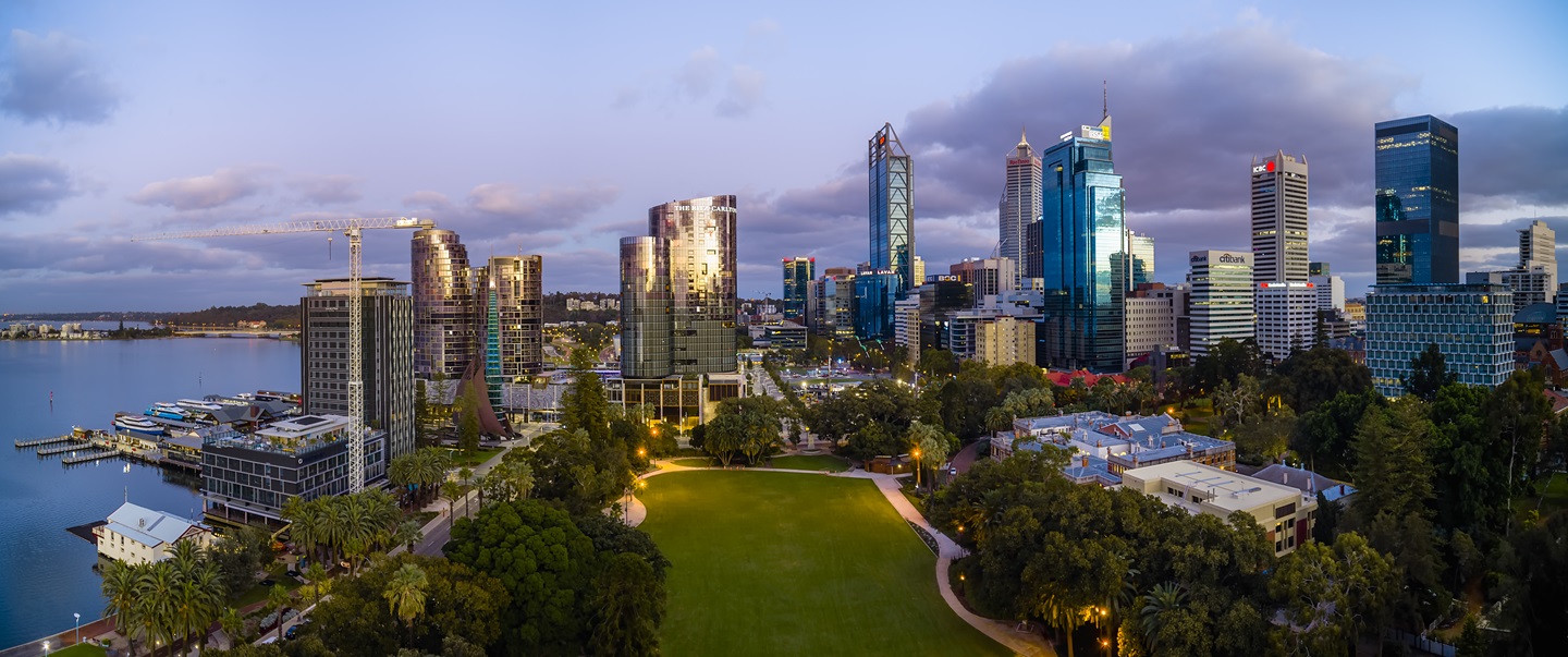 Picture of supreme court gardens with city buildings in the background
