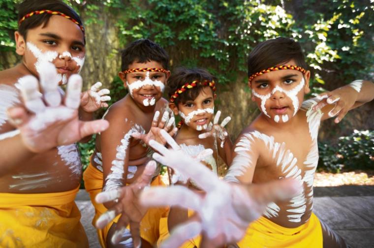 Aboriginal children pose with dance moves