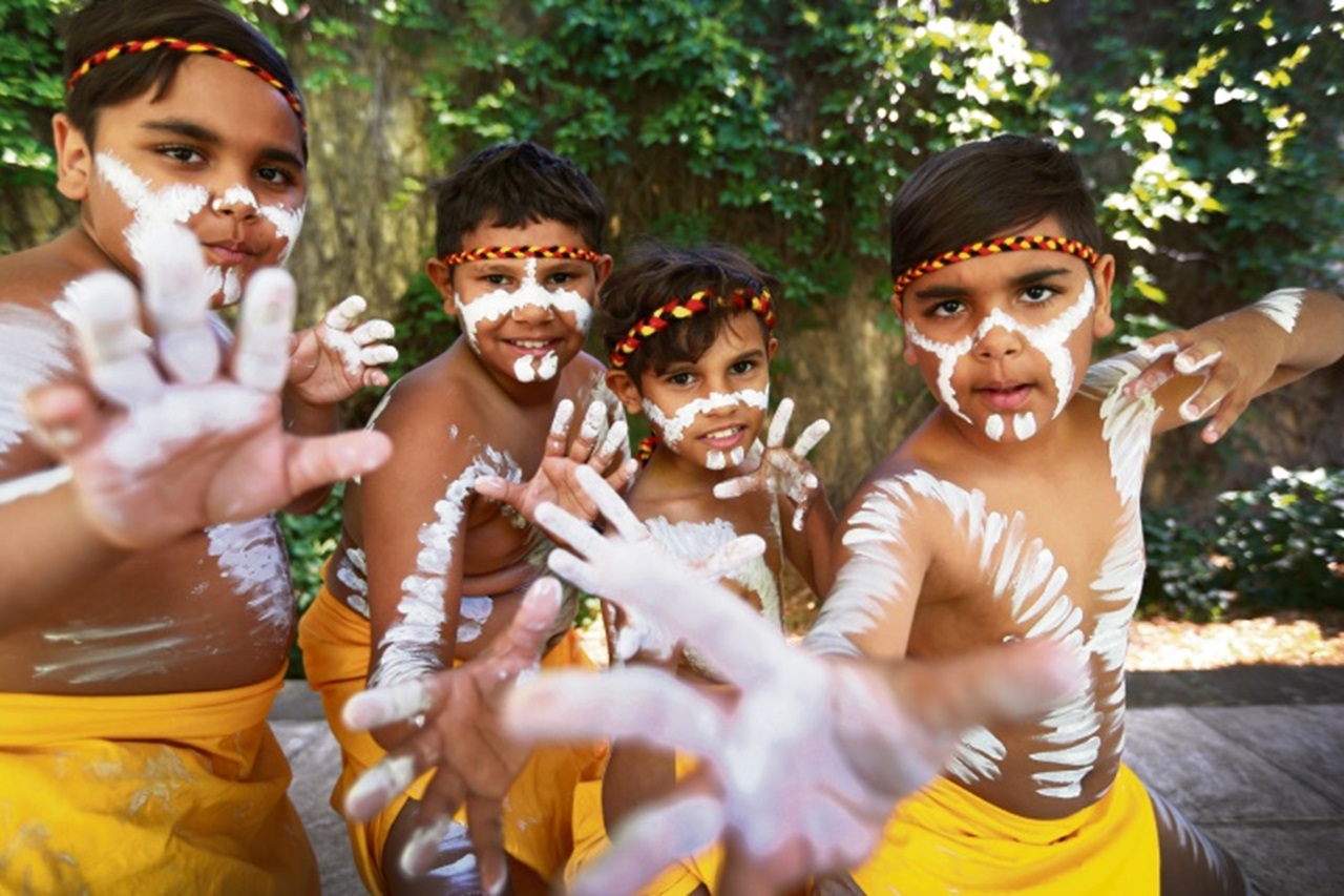 Aboriginal children pose with dance moves