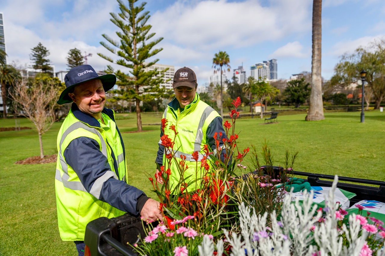 Staff working outdoors in local parks