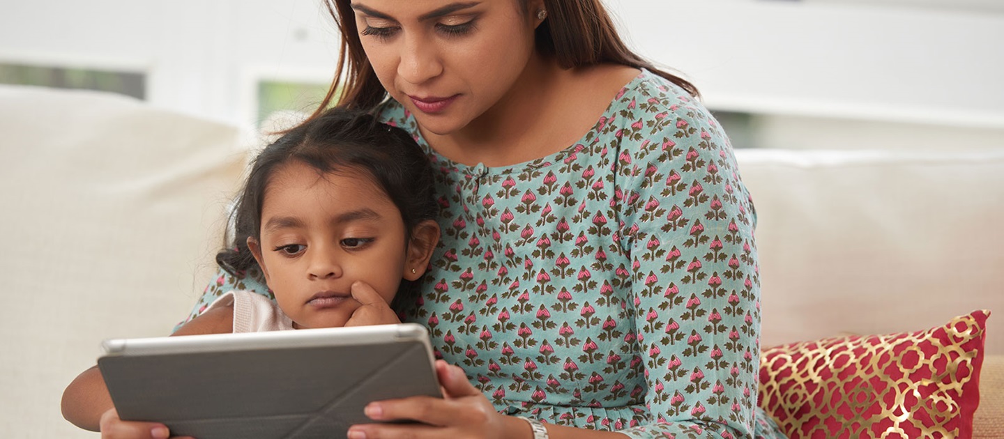 Mother and child watching storytime on tablet