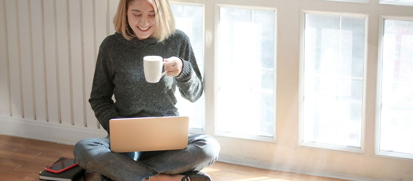 Young woman looking for resources on online catalogues